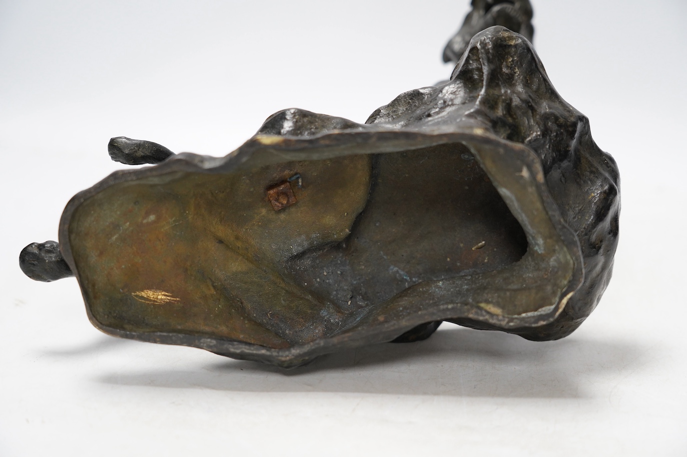 After Thomas Francois Cartier (1879-1943), bronze study of a roaring tiger, signed in the casting, 26cm wide. Condition - fair - tail has been detached and re-attached.